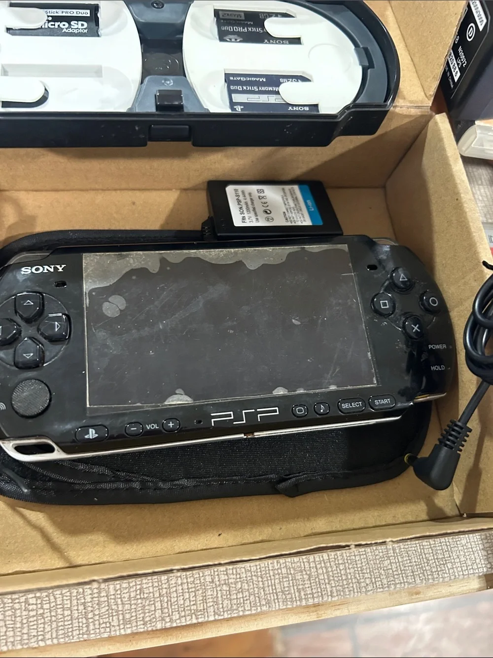 Sony PSP Portable Gaming System Bundle - Black and White Accessories